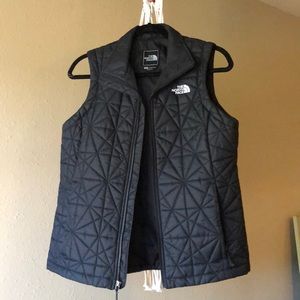 New, black North Face down vest